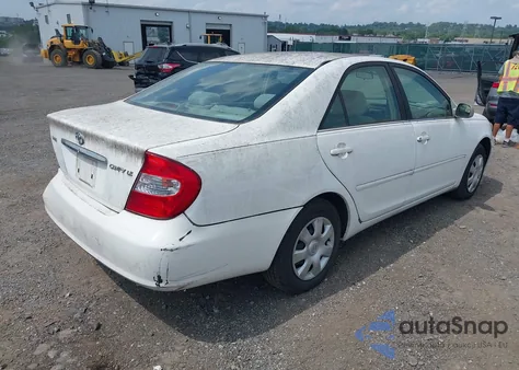2002 Toyota Camry Le z USA, uszkodzony, nr VIN 4T1BE32K22U007484